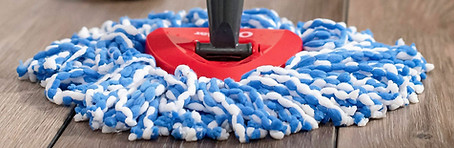 O Cedar floor mop with woman Gert My Supplies.jpg