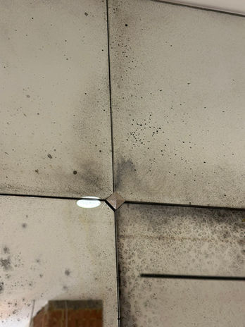 Heavy distressed antique mirror