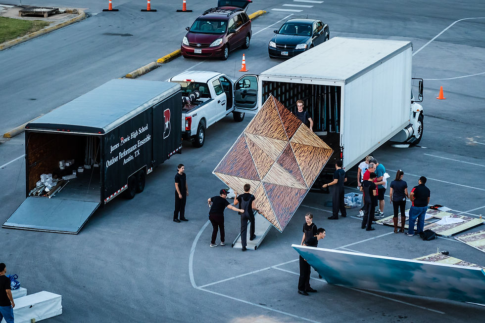 Prop crew unloading a 3-sided house (why not?) for AND THEN I SAW THE SKY (James Bowie HS OPE), seen below at Bands of America San Antonio Super Regional at the Alamodome. Photo Credit: (c) Russ Pankratz 2017 -