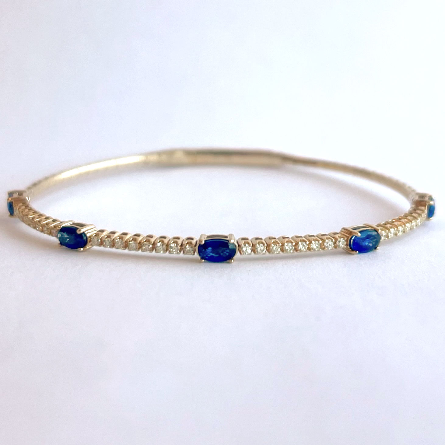 14KT YG 1.41CTTW SAPPHIRE & .38CTTW DIAMOND FLEX BANGLE