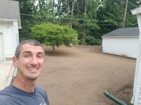 John Schott in front yard after all landscaping removed in Indianapolis, Indiana.