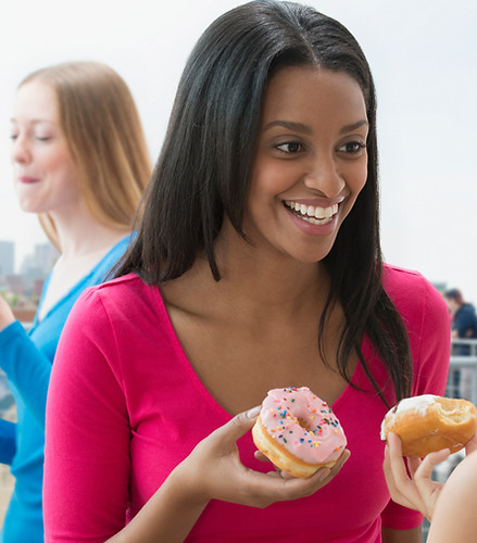 Women Eating Donut