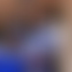 From top to bottom:  Soror Kaye Kerr-Roberts  Soror Tiffany Hall  Soror Candace Wilson standing in a line one behind the other posing with the Zeta Phi Beta kitty sign