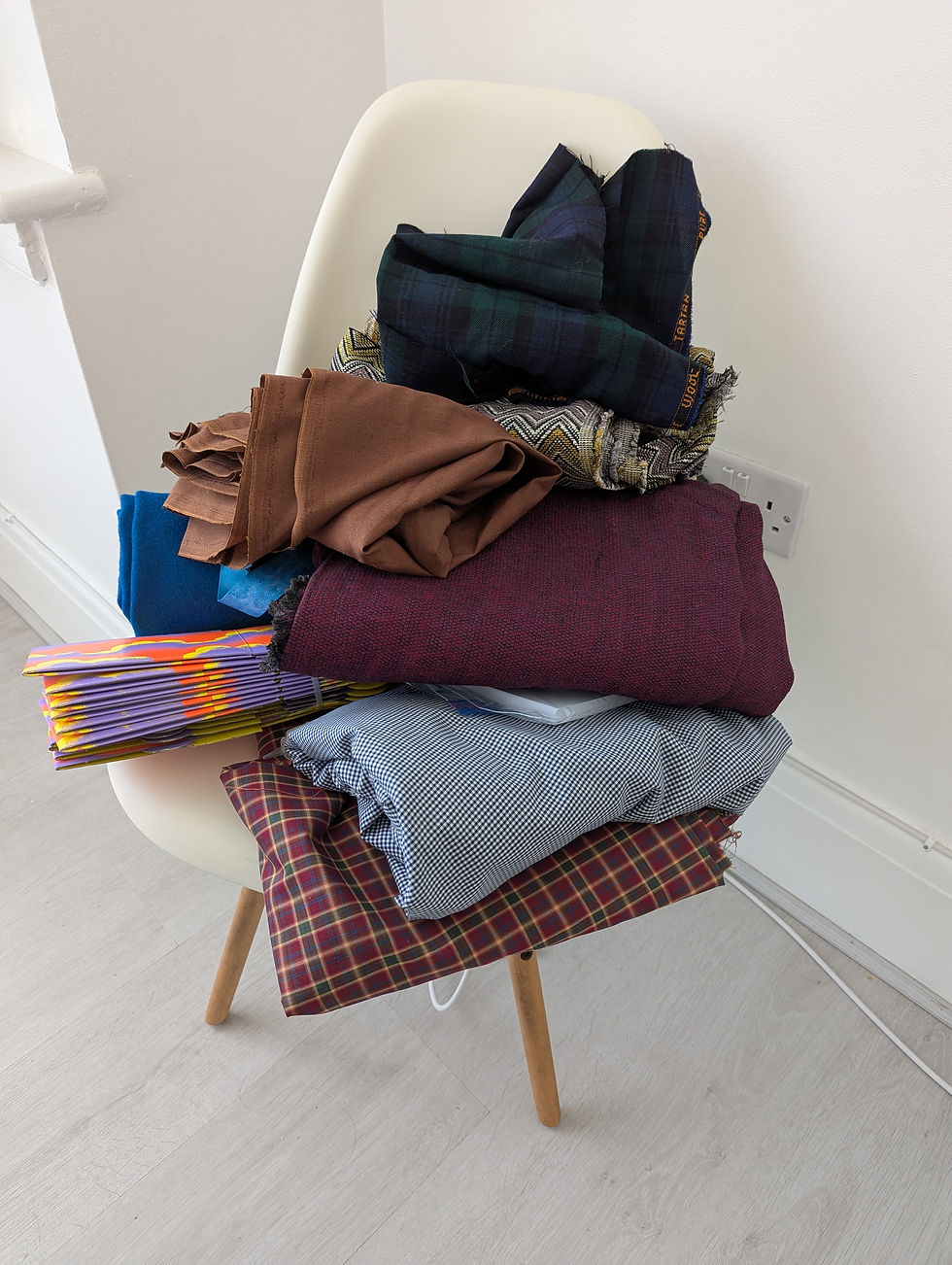 Portion of the craft haul. The puple and orange things are old Lush gift boxes. The fabrics were all tied up with what appeared to be leftover ribbon from race medals.