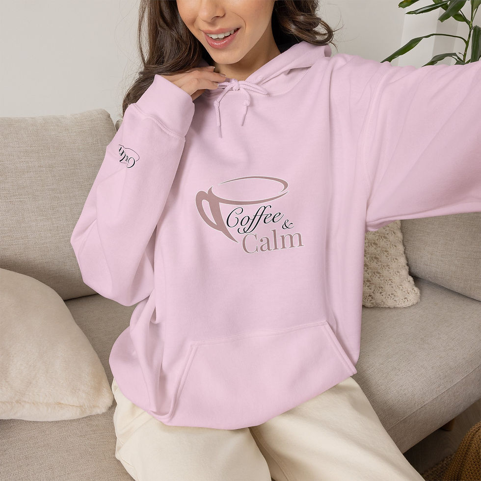 Thumbnail: Coffee & Calm Cosy Hoodie from the front in light pink with a woman wearing it