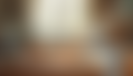 A calm family breakfast setup with cereal bowls and fruit