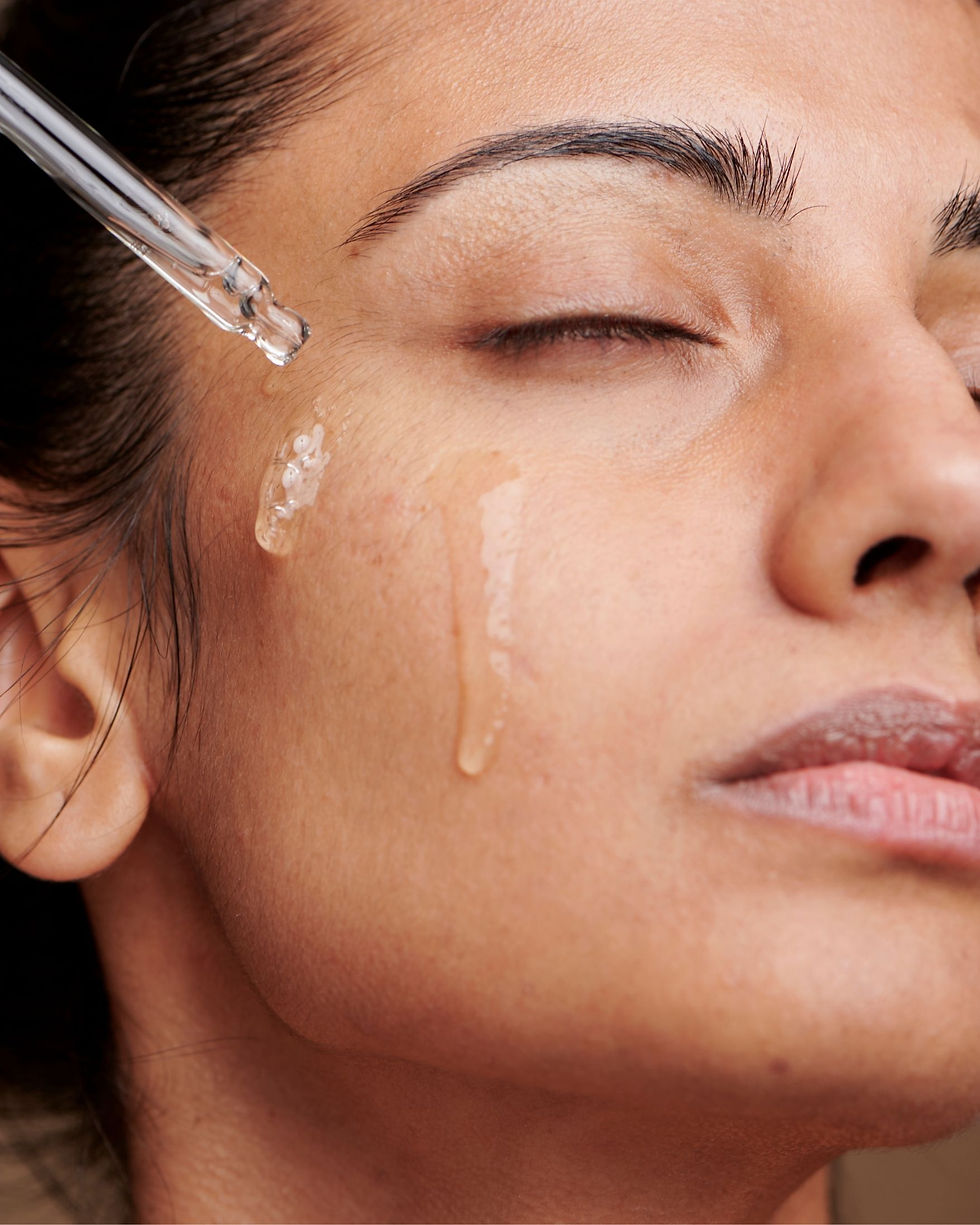 Enhancing a youthful glow with an anti-aging eye serum, offering a natural alternative to botox and injectables.