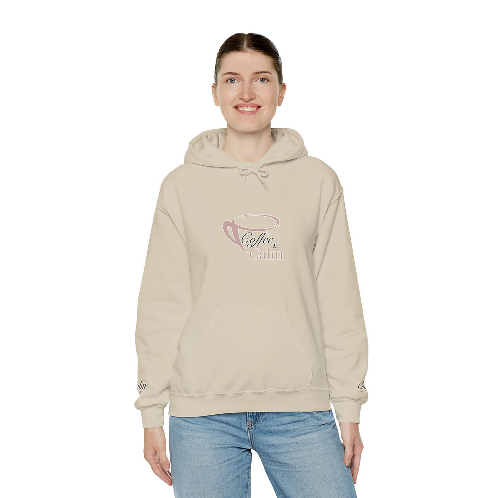 Thumbnail: Coffee & Calm Cosy Hoodie from the front in sand with a woman wearing it