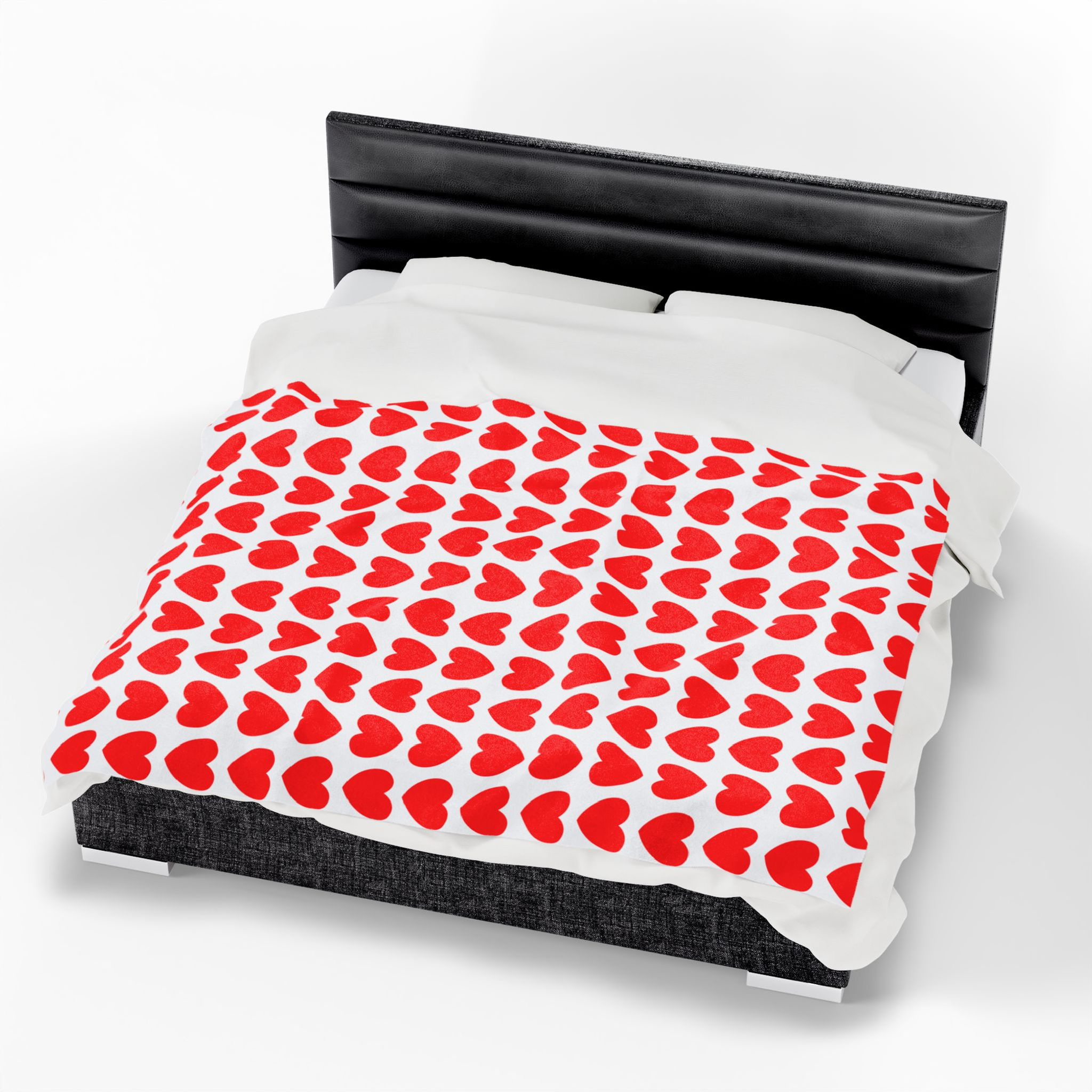image of the red heart blanket on a king size bed