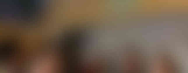 Elinor, Thomas, Jenny, and Pauline at the table, eating and having fun.