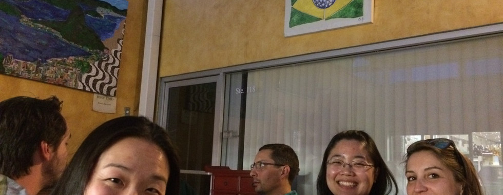 Elinor, Thomas, Jenny, and Pauline at the table, eating and having fun.