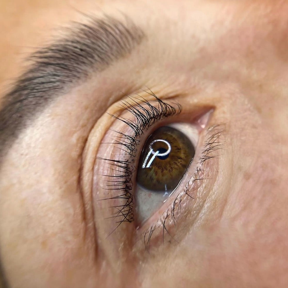 Mature woman with naturally short lashes who has a lash lift that has emphasised her lash line