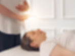 Woman enjoying Energy Healing Reiki Treatment . Chakra Balancing, Aura cleansing, Holistic
