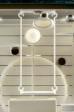 The magnetic swing is installed inside an enclosure.