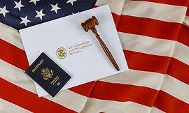 US Passports with wooden judge gavel on 
