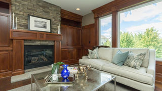 Living space with custom woodwork and built-ins