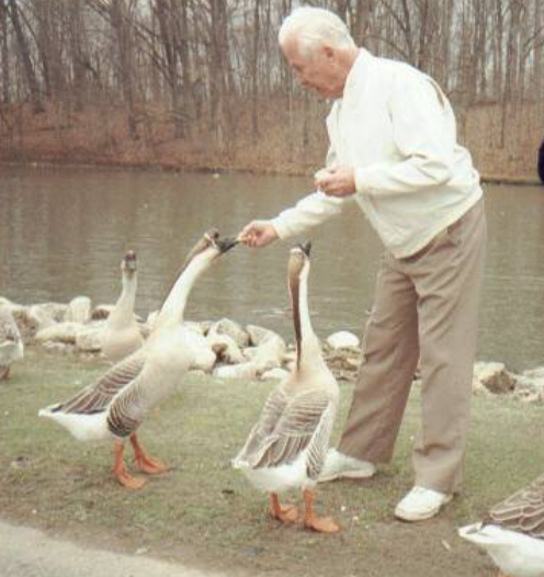 Fred Larson Feeding Geese