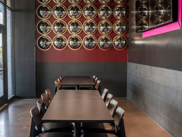 focal point wall with 3d mirror design chandelier lighting large tv for sports tile wainscoting in restaurant design