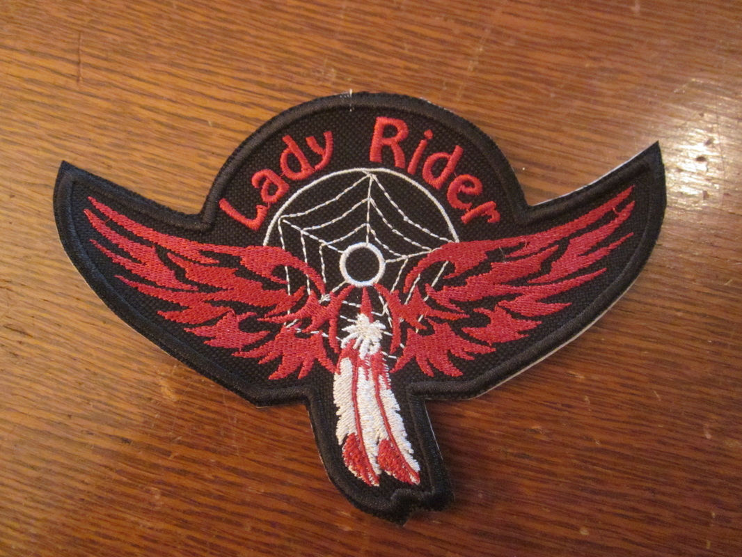 Lady Rider/dreamcatcher/feather wings