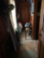 Unheated back hall is devoted to vintage ski and snow gear. Infamous privvy is dead ahead.