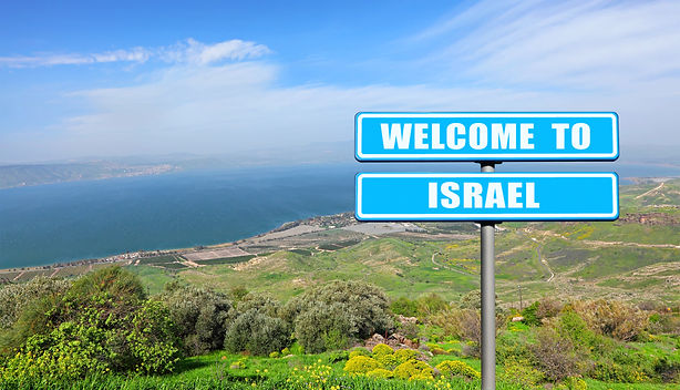 Blue road sign " Welcome to Israel " - the invitation to the Israel (visit and travel) aga