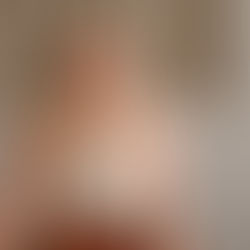 Courtney Greth a Denver Colorado Massage Therapist smiling at the camera