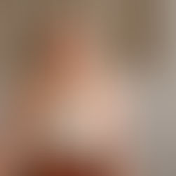 Courtney Greth a Denver Colorado Massage Therapist smiling at the camera