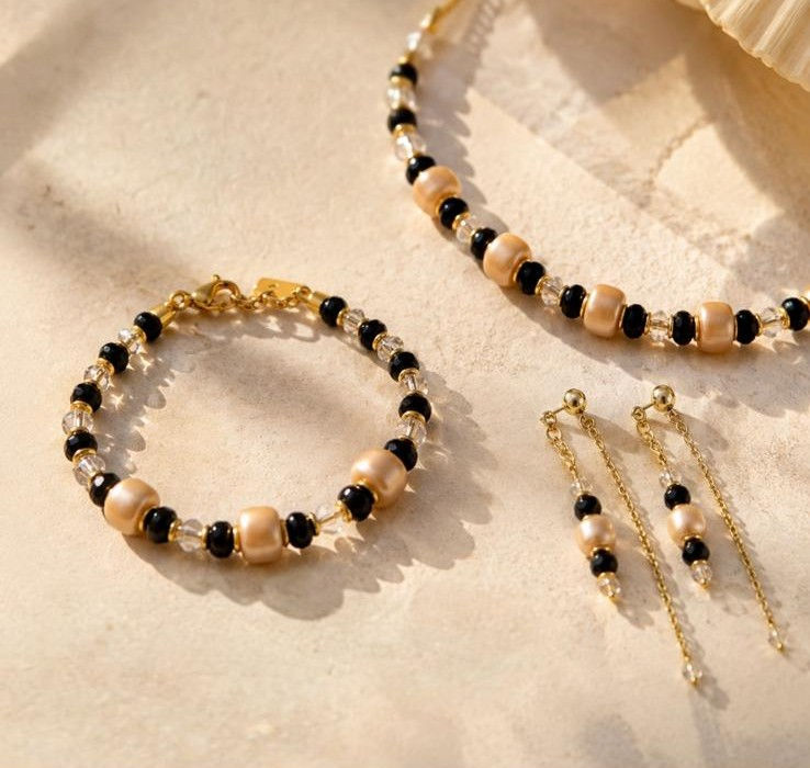 Thumbnail: Oorbel Beige Ceramic & Black Glass
