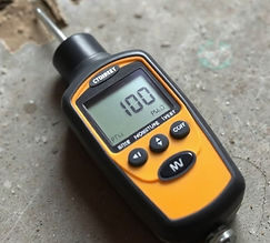 moisture meter on old concrete slab_edit