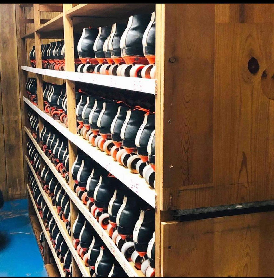 Picture of the skates on shelves in the rental area