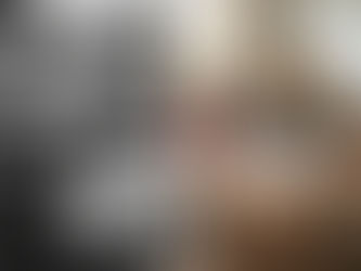 student being spoon fed in black and white and a group of students working independently 