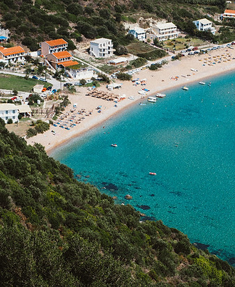 Oceanfront all-inclusive resort in the Caribbean with a white sand beach and clear blue water.
