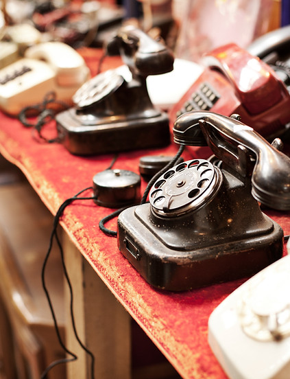 Old telephones in a row