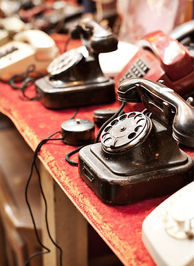 Old telephones in a row