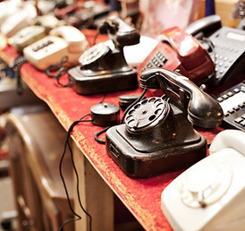 Old telephones in a row