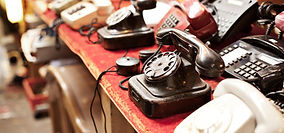 Old telephones in a row
