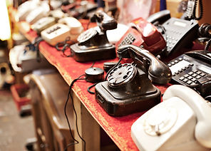 Old telephones in a row