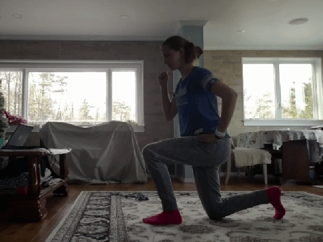 Kneeling lunge to standing with overhead press