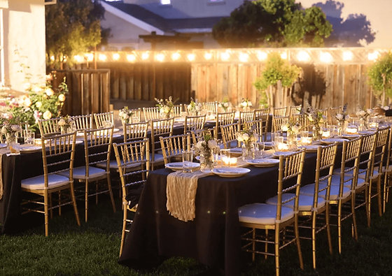 Luxury tea party setup with fresh flower arrangements and elegant table styling