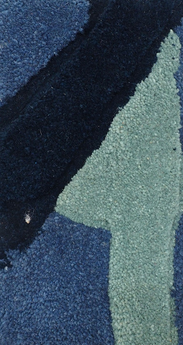 Détail d'une tapisserie murale de Tina Tictone