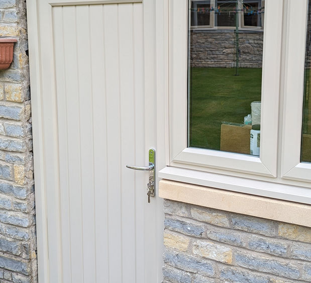 A door and window in stoney ground colour