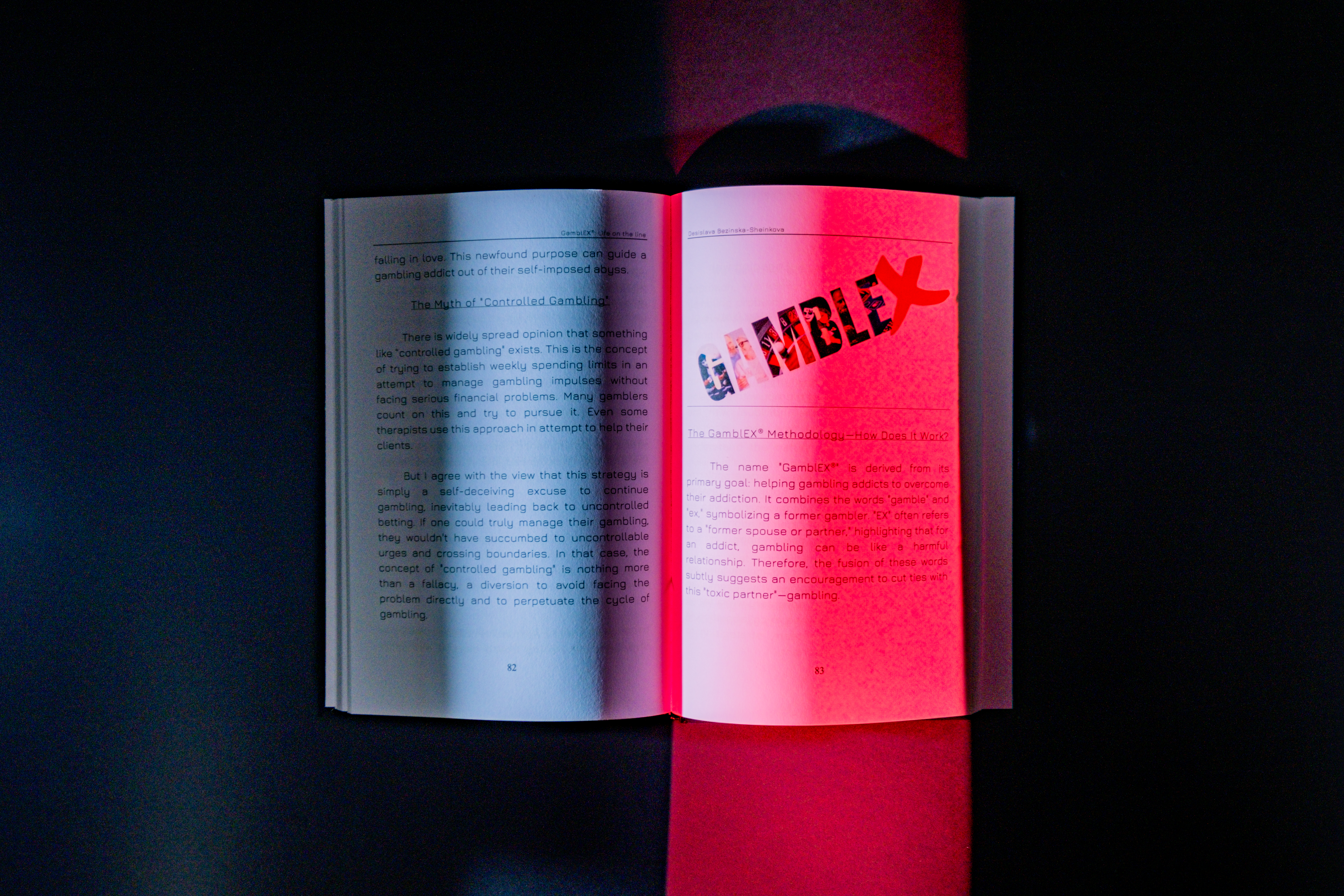 The book "GambleX: Life on the Line" is open on a table, displaying a passage about gambling addiction