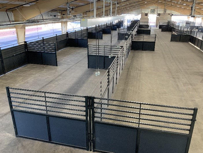 Empty horse stalls in Stall Barn A.