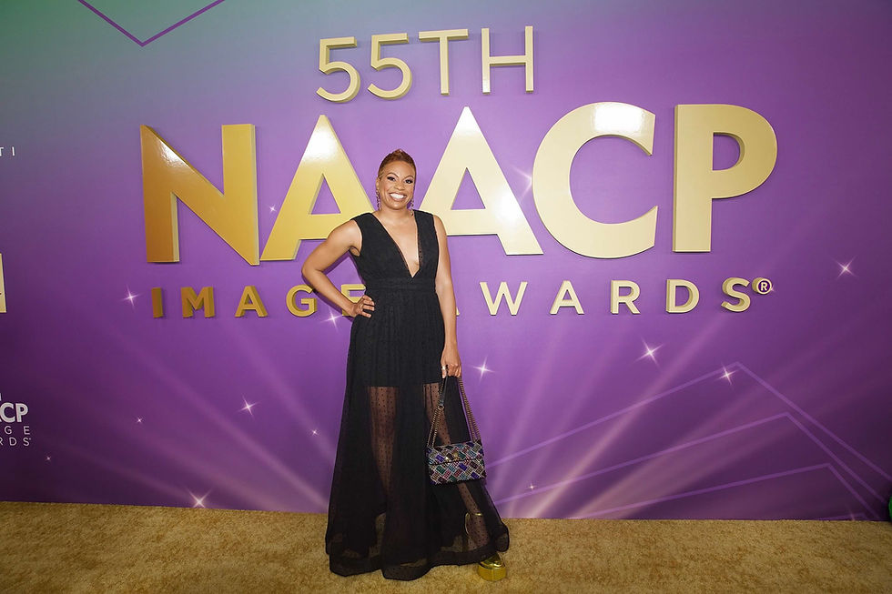 Crystal Marshall posing on the red carpet at the NAACP Image Awards.