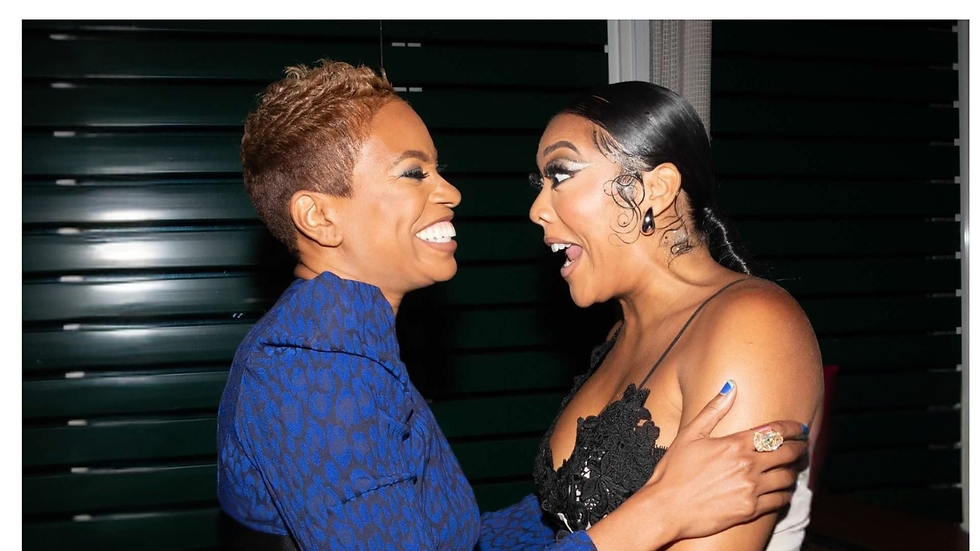 Crystal Marshall shares a joyful moment with actress and influencer Khadeen Ellis, representing confidence, connection, and composure in high-profile environments.