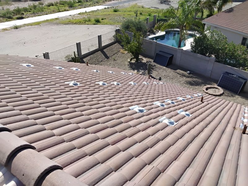 Tile repairs underway on a Tucson-area home