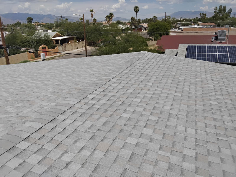 Freshly replaced asphalt shingle roof