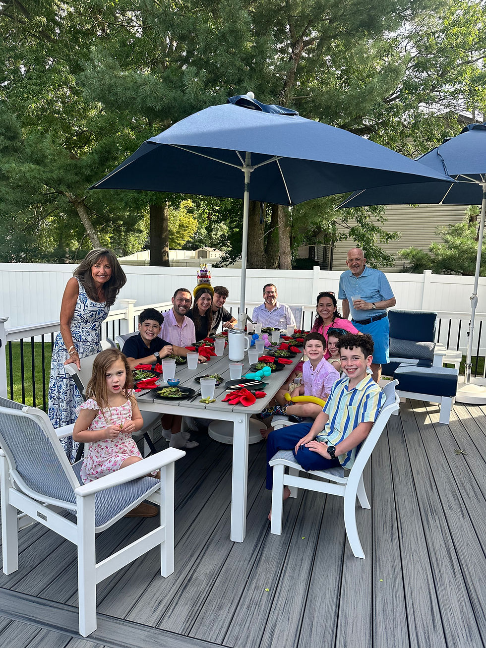 Family enjoying a backyard hibachi party in Cherry Hill, New Jersey