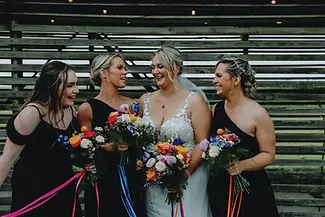 Maroon Bridal Party with Flower Bouquets.webp