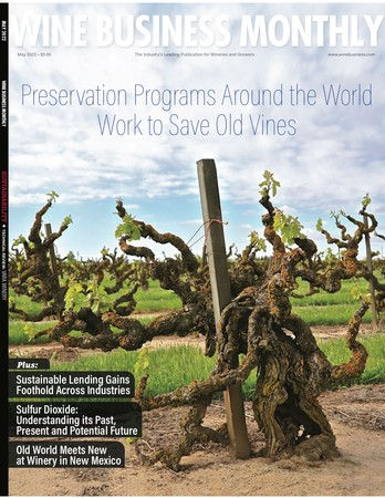 The May 2022 cover of Wine Business Monthly, festooned by a classic old vine Zinfandel plant (Marian's Vineyard, planted in 1901).